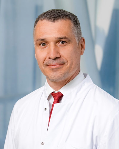 Portrait von Dr. med. (RUS) Petr Sergeev
